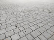 Cobblestone texture. Gray paving stones outside close-up. Design blank