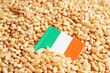 Ireland flag on grain wheat, trade export and economy concept.