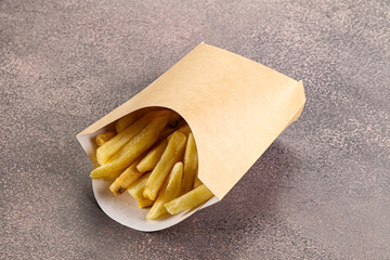 Wall Mural - Crispy salted French fry potato