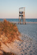 Lifeguard Tower on an empty beach in Harwich during sunset
