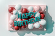 Happy Birthday Celebratory Balloons with Elegant Box and Festive Mood.