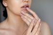 Beauty Woman face Portrait. Beautiful Spa model Girl with Perfect Fresh Clean. Nail Care And Manicure.