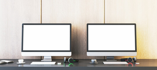 Poster - Two empty white gaming computer monitors on desk with coffee cups and headsets. Place for your advertisement. Gaming club concept. Mock up, 3D Rendering.
