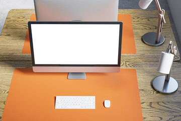 Poster - Close up and above view of designer office desk with white mock up computer screen on wooden desk, rug, lamp and other items. Mock up, 3D Rendering.