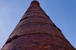 Red brick chimney..Large chimney in an old factory.
