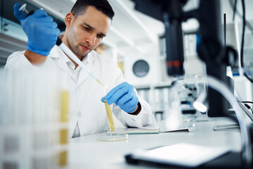 Poster - Science, man and dropper on test tube for research, exam or chemical analysis for healthcare innovation in laboratory. Pipette, serious scientist and medical study for drugs, liquid or biotechnology