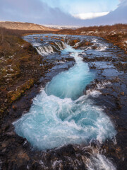 Sunrise at Bruarfoss, Blue Waterfall in Thingvellir National Park, Iceland