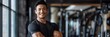 © Terry A.I. Gallery - Japanese Male Personal Trainer Smiling with Gym Background