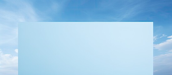 Poster - The black blank page provides a contrasting and clean copy space image against the natural blue sky paper texture background