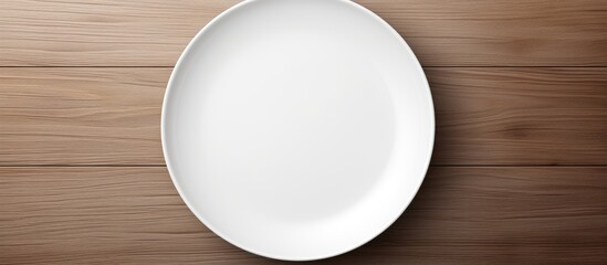 An empty white dish is seen from a top down perspective providing ample copy space for arranging food