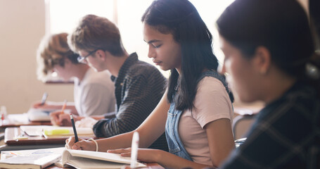 Aufkleber - High school, students and group at desk in classroom for learning education, academic or scholarship. Boy, girl and books at academy campus for future development or lesson, assessment or friends
