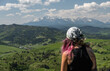 Young woman trekking in Pieniny Mountains in Poland. Healthy outdoor hike