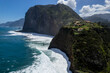Madeira coast, green lush hills and Atlantic Ocean. Aerial drone view