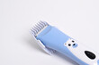 Wireless hair trimmer for babies and children isolated on a white background.