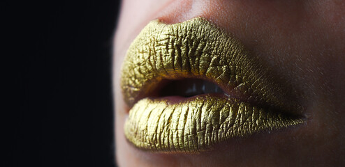 Lip icon with golden glitter effect. Sensual mouth. Symbol of kiss from golden lipstick. Glamour luxury gold mouth. Gold paint on lips. Golden lips, sensual woman mouth. Metallic body. Gold concept.