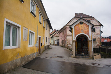 Wall Mural - Lepo Znamenje, known as the Beautiful Shrine, in a southern suburb of Skofja Loka, in Gorenjska, Slovenia