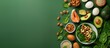 Assortment of fruits and vegetables featured in a green background