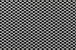 White expanded metal mesh on black background