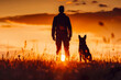 Man and dog silhouette against sunset
