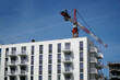 © PX Media - Modern multistorey building and construction crane