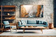 Blue armchair and sofa, book shelf against grey stone cladding wall. Loft interior design of modern living room, home.