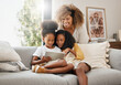 Black family, kids and tablet for gaming, learning or streaming on sofa of living room in home together. Funny, tech and happy mother laughing with girl children in apartment for homework or study