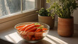 Homegrown organic carrots in a bowl on the kitchen table