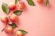 Fresh Peaches With Vibrant Leaves Arranged on a Soft Pink Background