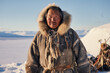 Inuit man with traditional fur clothing, Alaska