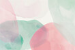 Pink and green abstract shapes on a white background