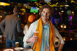 Portrait of handsome guy football holding soccer ball and glass of beer