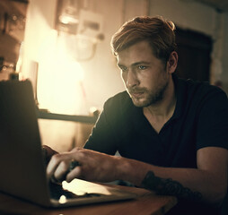 Poster - Home, night and man with typing on laptop for freelance job, web design and online communication. Remote work, overtime and developer with technology at table for programming, network and planning