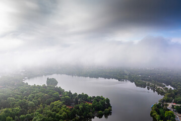 Wall Mural - Bucharest from above aerial photo. Cloudy spring morning landscape with the north part of Bucharest, next to Arch of Triumph and Free Press Square (Piata Presei Libere in Romanian). Travel to Romania.