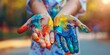 Hands Covered in Colorful Paint Showcasing the Therapeutic Process of Art Therapy and Creative Self Expression