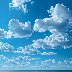 Wall Mural - scenic view of a clear blue sky with fluffy white clouds in the background.