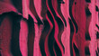 Concrete wall with carved deep relief grooves, chaotic wavy pattern with rough red pink surface texture color.