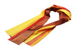© peerasak - A scarf with yellow, orange and brown stripes is laying on a white background