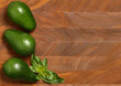 ripe organic avocado for healthy eating on wooden background