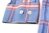 Fototapeta  - Frayed sleeve cuff on long sleeve men's shirt on white background