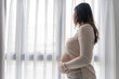 © Charlie's - worried pregnant woman concerned and anxious woman in pregnancy overthinking worrying about pregnancy problem Pregnancy depression Mental health