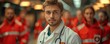 © gearstd - Doctor with a medical team in red