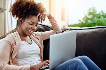 Poster - Happy, african woman or student with laptop on couch for remote learning, study or streaming tv at home. Female person, computer and smile for online education, research or entertainment