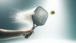 Dynamic action shot of a pickleball paddle striking a ball with a splash effect of water against a soft background with copy space. Concept for sports equipment marketing and recreational themes.