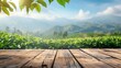 Wooden table with a lush green landscape of a tea plantation in the background for mockup