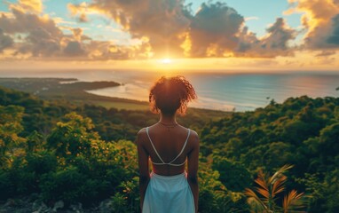 A woman is standing upright on a hill covered in vibrant green vegetation