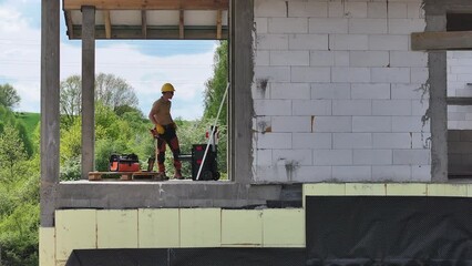 Wall Mural - Construction Worker Painting House Exterior