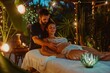© Iftikhar alam - A man and woman enjoying spa treatments together in a serene spa setting, A couple getting pampered with a romantic couples massage