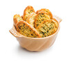 Garlic crisp bread Slices Topped With Herbs in bowl isolated on white background.