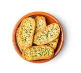 Fototapeta Lawenda - Garlic crisp bread Slices Topped With Herbs in bowl isolated on white background.