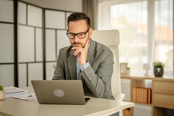 One men working in the office using technology